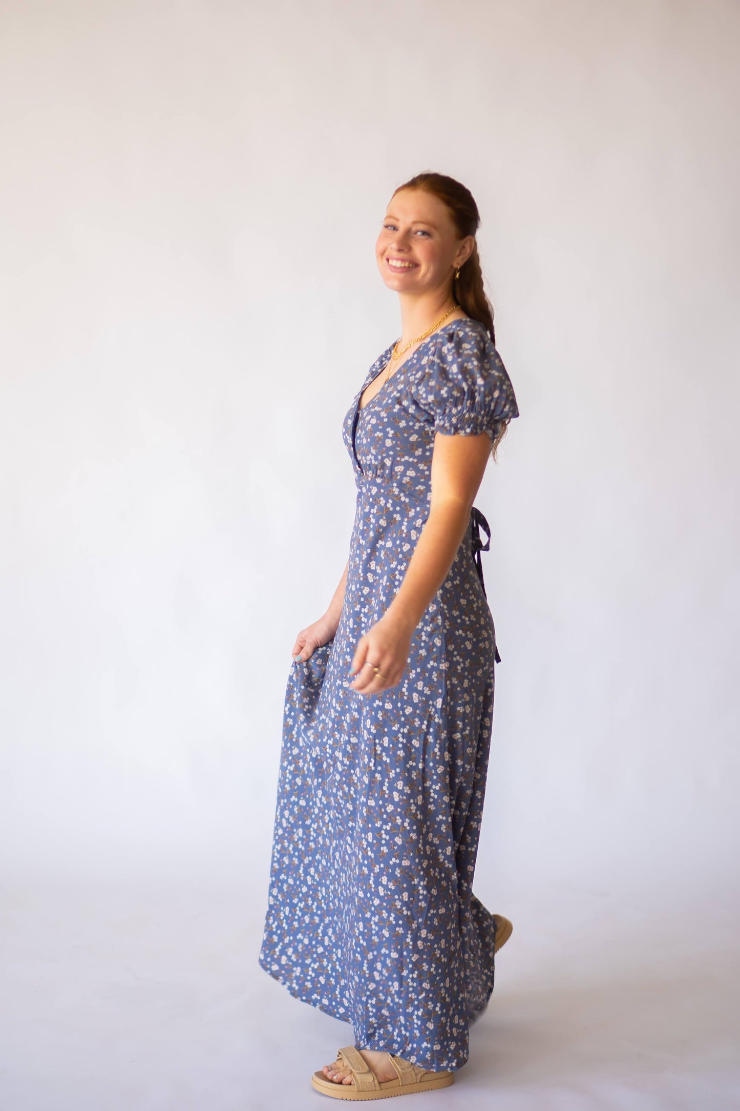 Maxi dress in blue with floral detail