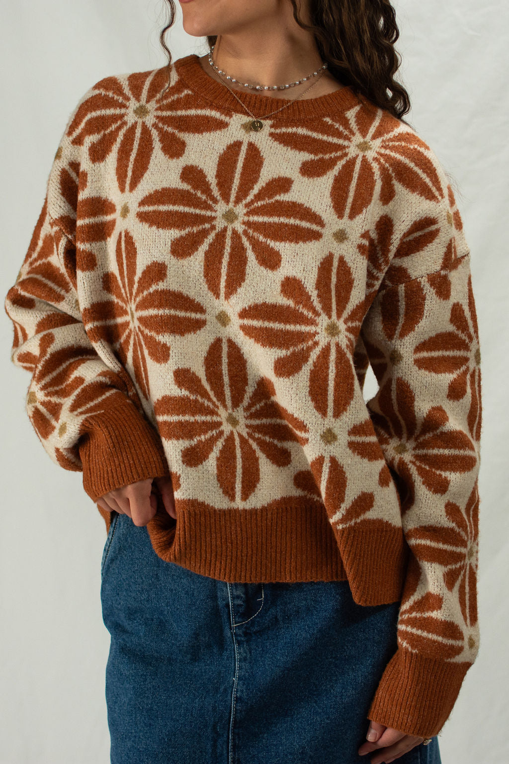 Cream floral sweater with rust flowers