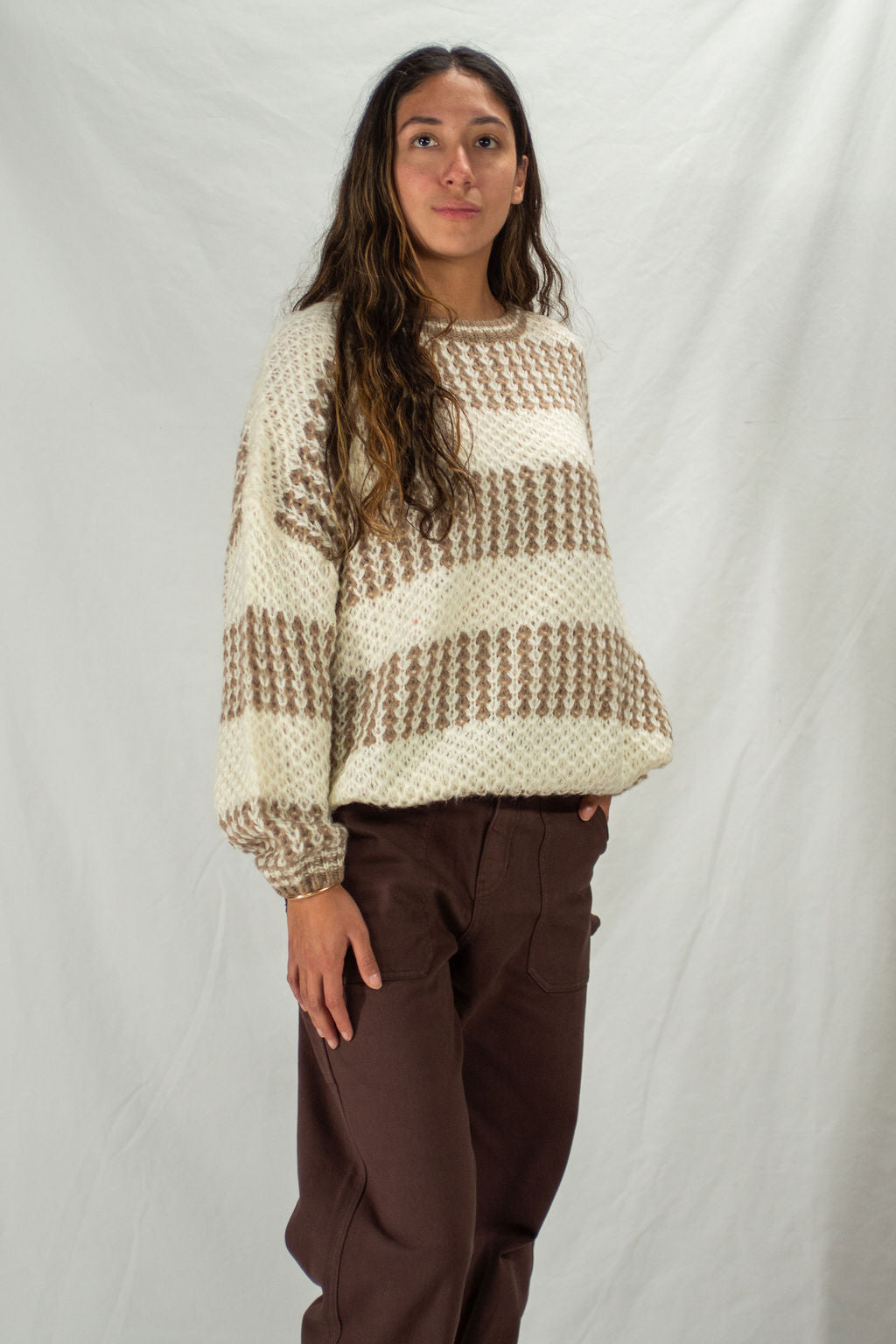 Cream knit sweater with brown stripes