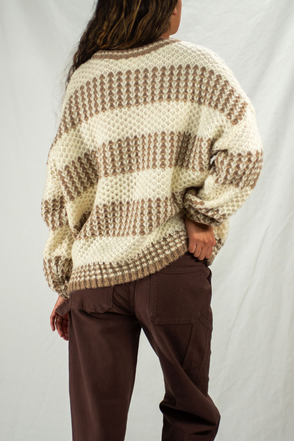 Back of cream and brown striped sweater