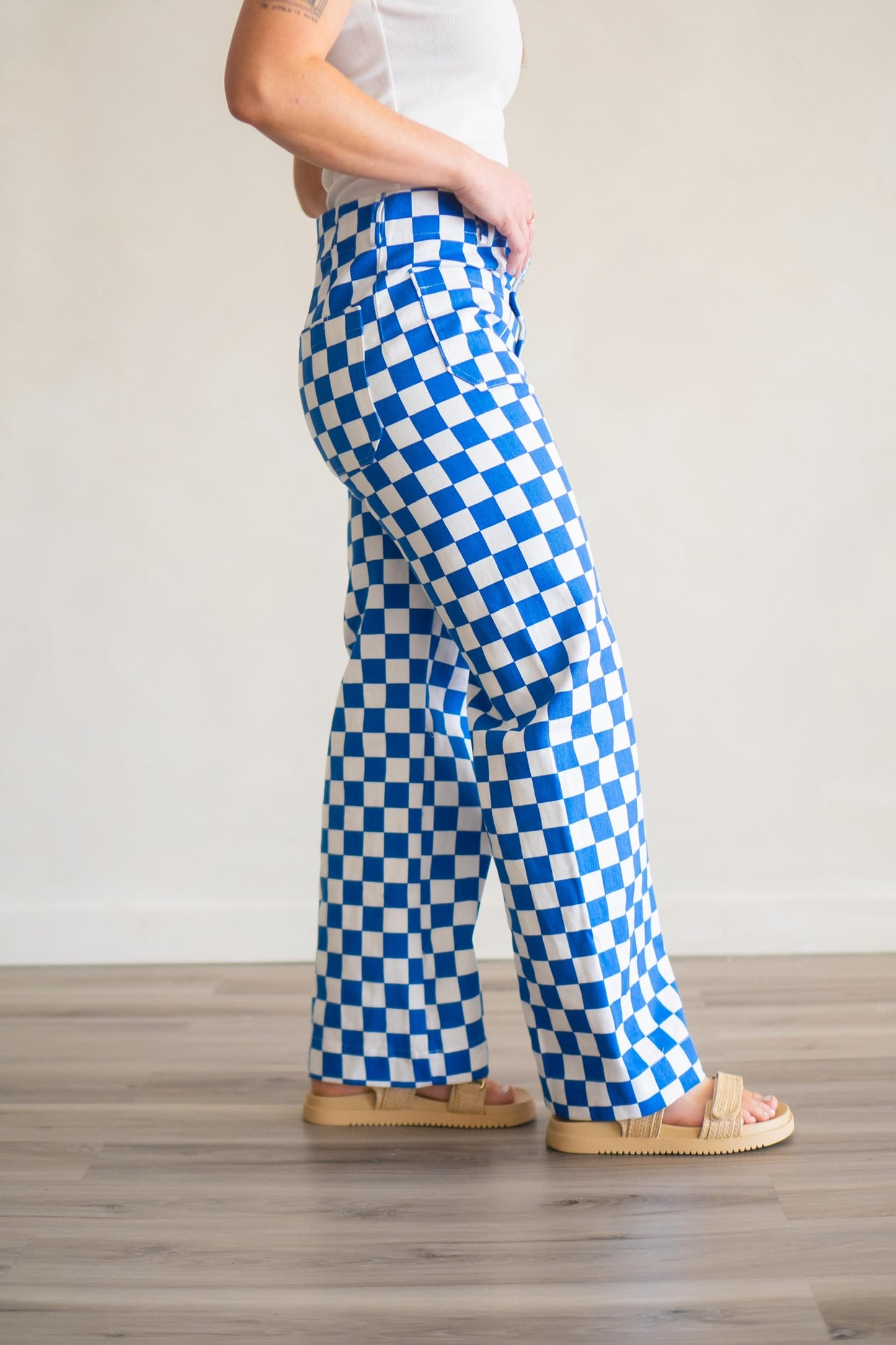 Blue and white square checkered pants in denim. 