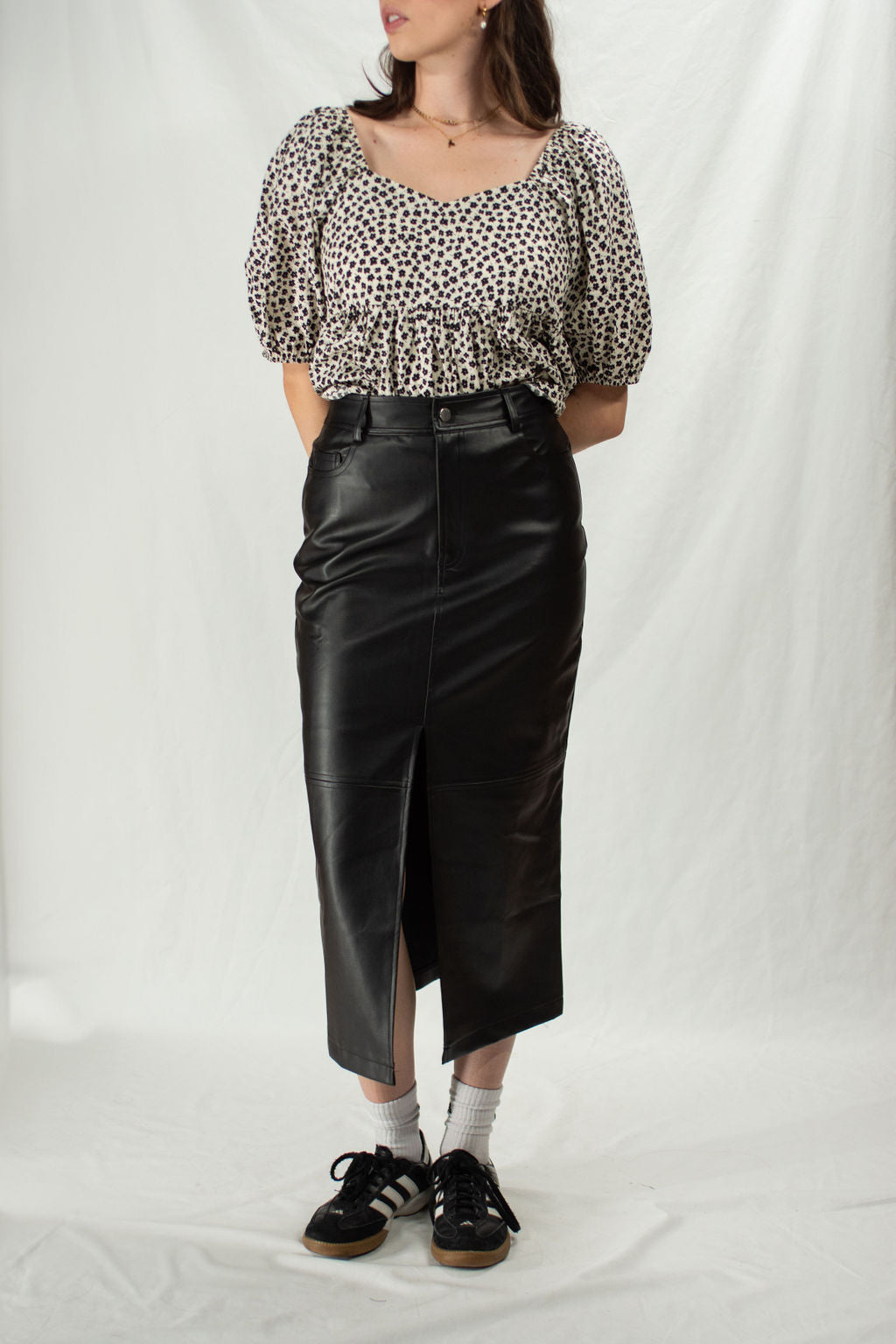 Faux leather black midi skirt with front slit