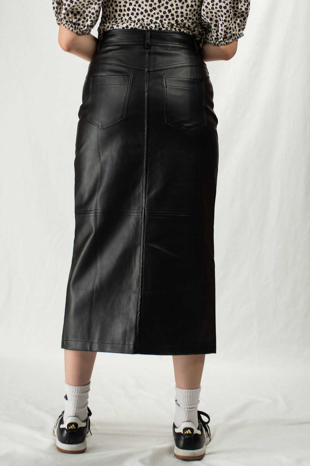 Back of faux leather black long midi skirt