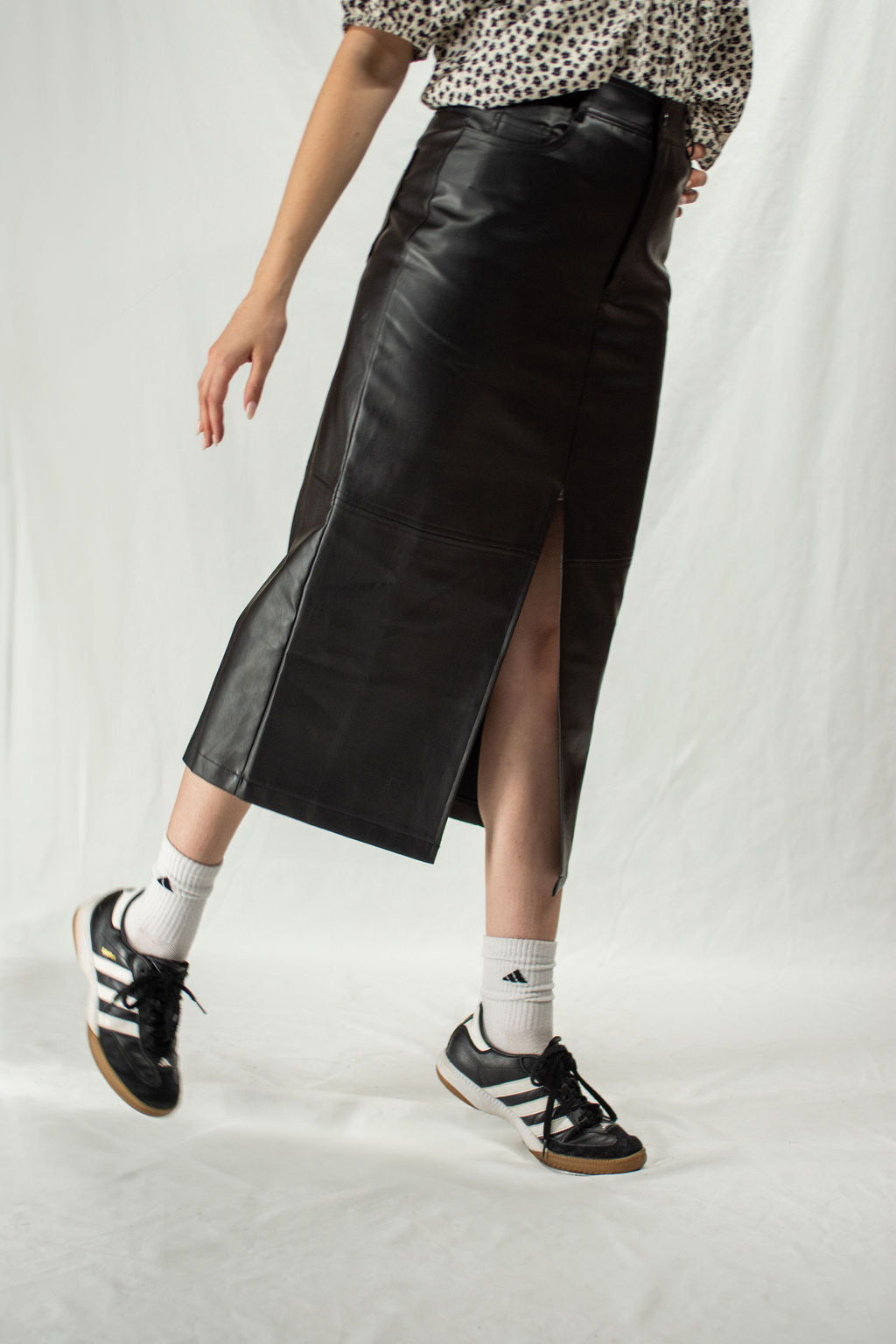 Black faux-leather maxi skirt with front slit